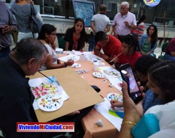 Joel Ramos en el Dia Munidal Pintor Boca y Pie